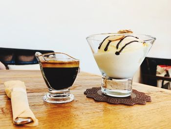 Close-up of coffee served on table