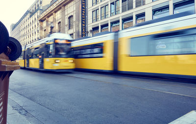 Blurred motion of train at railroad station in city of berlin