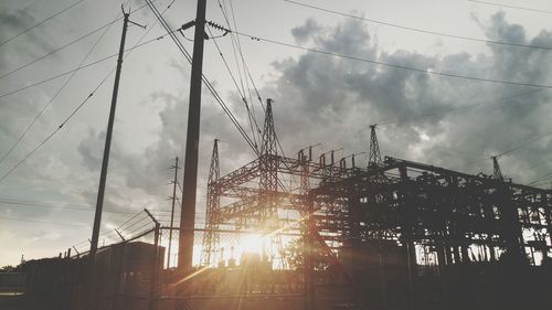 Low angle view of construction site at sunset