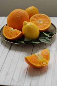 High angle view of oranges in plate