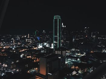 Illuminated cityscape at night