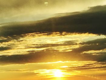 Low angle view of dramatic sky during sunset