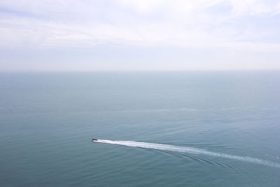 High angle view of boat in sea against sky