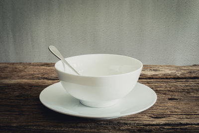 Close-up of coffee cup on table