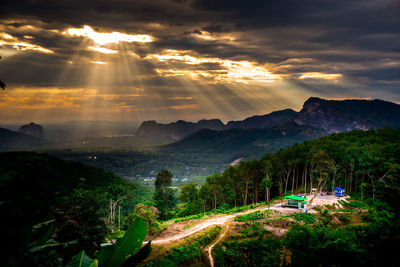 Scenic view of landscape against sky during sunset