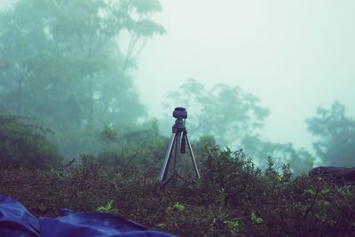 High angle view of tripod at lakeshore