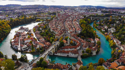 High angle view of river amidst buildings in city