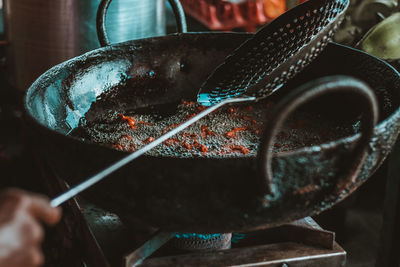 Close-up of person preparing food