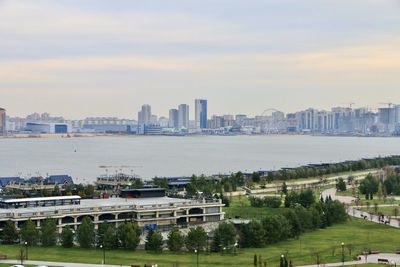 High angle view of city and buildings against sky