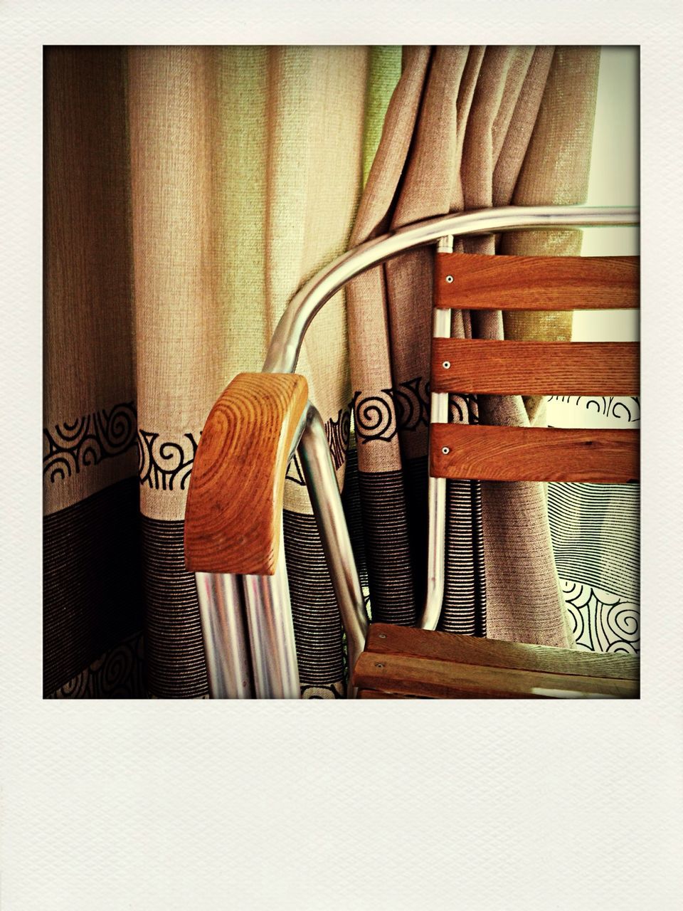 transfer print, auto post production filter, indoors, still life, close-up, table, no people, absence, stationary, hanging, metal, transportation, wood - material, equipment, day, old-fashioned, group of objects, land vehicle, bicycle, retro styled