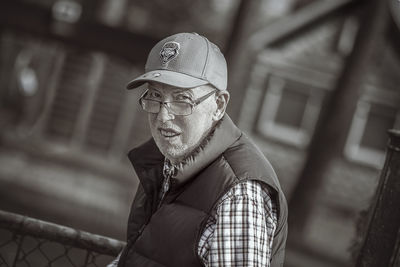 Portrait of man standing outdoors