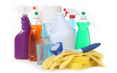 Various bottles on shelf against white background