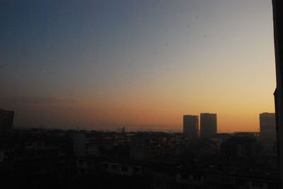 View of cityscape at sunset