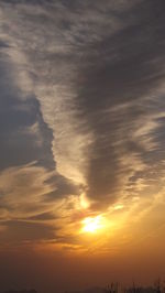 Low angle view of dramatic sky during sunset