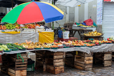 A market stall with fruits and vegetables for sale in the city of santo amaro in bahia.