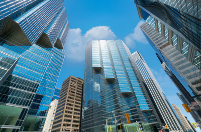 Low angle view of modern buildings against sky