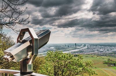 Scenic view of sea by city against sky