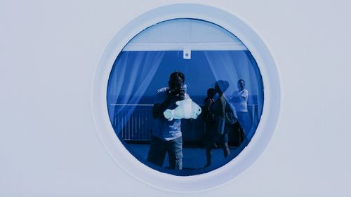 Reflection of woman in mirror