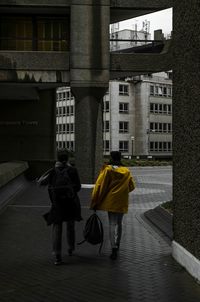 Woman with umbrella in a city