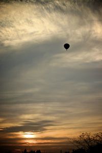 Low angle view of cloudy sky during sunset