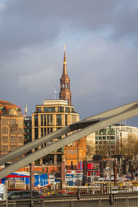 Buildings in city against sky