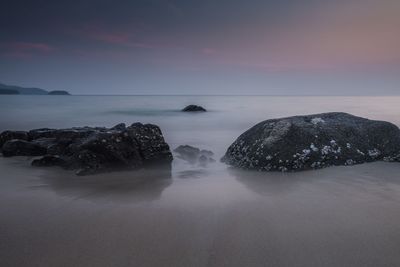 Scenic view of sea against sky during sunset