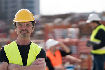 Portrait of confident architect at construction site