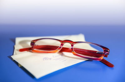 Close-up of sunglasses on table