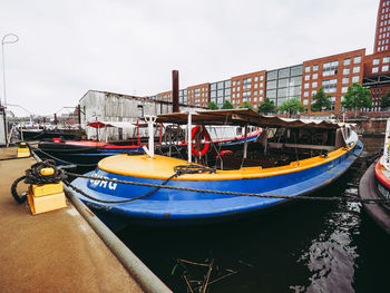 Boat moored in canal