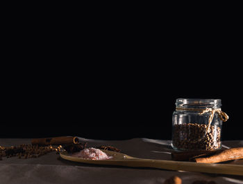 Scrub ingredients. homemade cosmetics. eco-friendly cosmetics. close-up, focus on a jar of grain