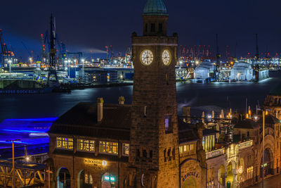 Illuminated buildings in city at night