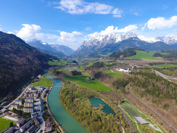 Panoramic shot of road by mountains against sky