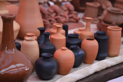 Close-up of earthenware for sale at market stall