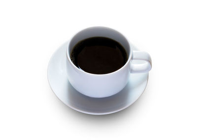 High angle view of black coffee over white background