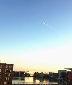 View of built structures against clear sky