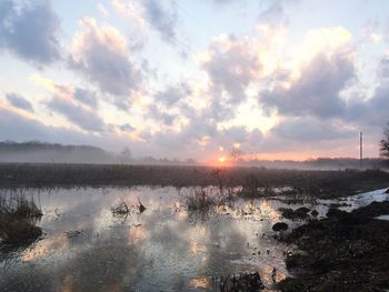 Scenic view of sea against sky during sunset