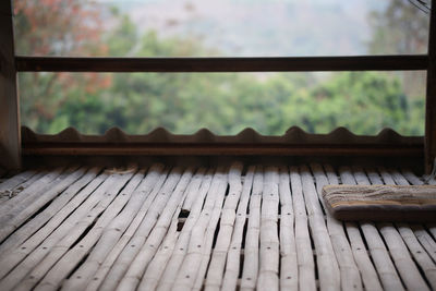 Close-up of wooden railing