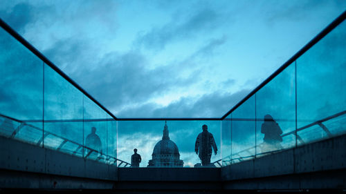 Low angle view of silhouette people on london millennium footbridge