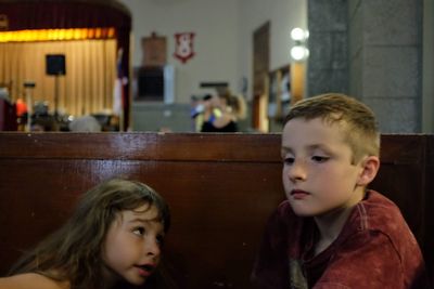 Siblings talking at home