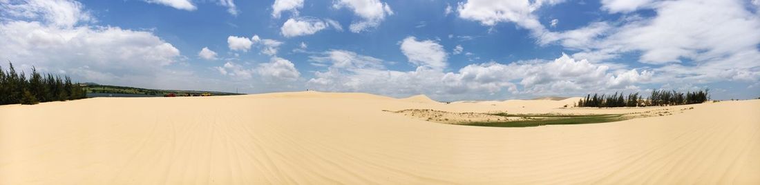 Panoramic view of desert against sky