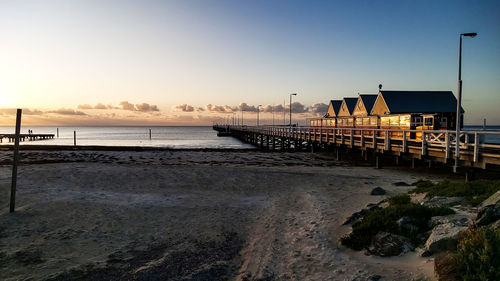 Scenic view of sea against clear sky during sunset