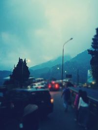 Cars on road in rainy season