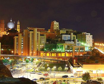 Illuminated cityscape at night