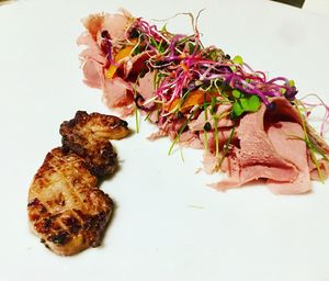 High angle view of fresh white flowers in plate