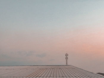 Low angle view of building against sky during sunset