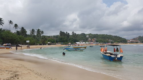 Scenic view of sea against cloudy sky