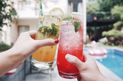 Close-up of hand holding drink