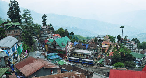 High angle view of buildings against mountain