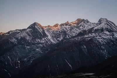 Scenic view of mountain against sky during sunset