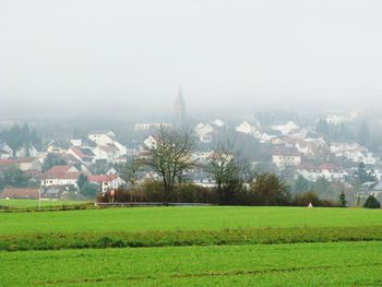 View of town in foggy weather